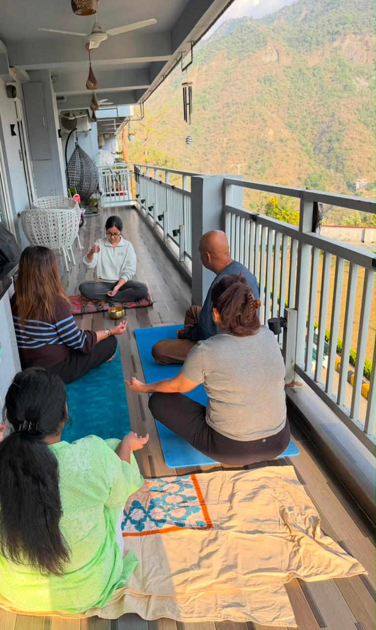 Sound healing session on a mountain balcony